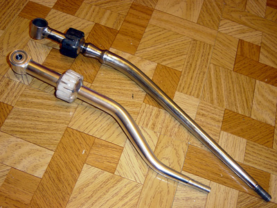 Top, Stock Chrome Shifter. Bottom Acura Short Shifter with ball seat.